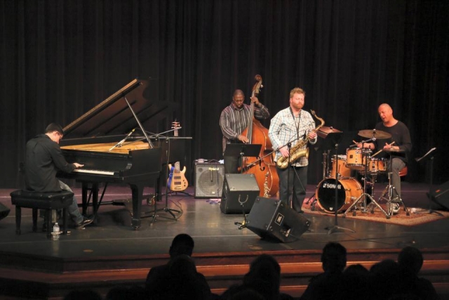 The Jae Sinnett Quartet performing at the Williamsburg Library Theater in 2015